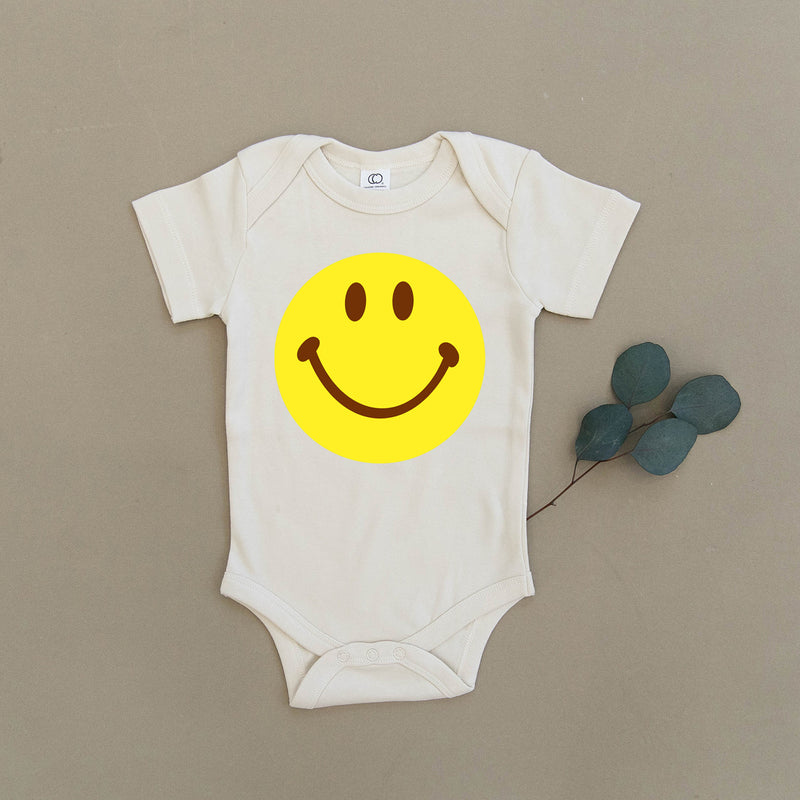 Yellow Smiley Face Organic Baby Onesie®